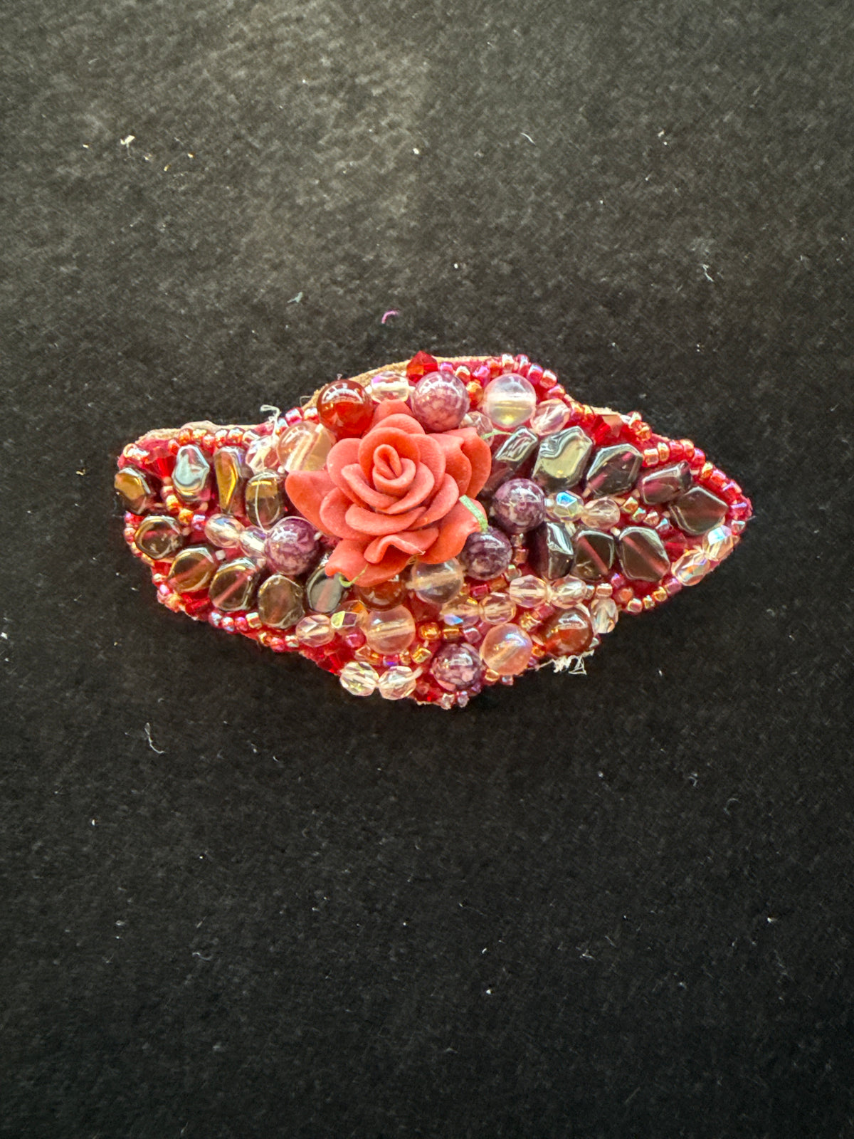 #488 pink rose seed, bead, and genuine, garnet hand zone barrette