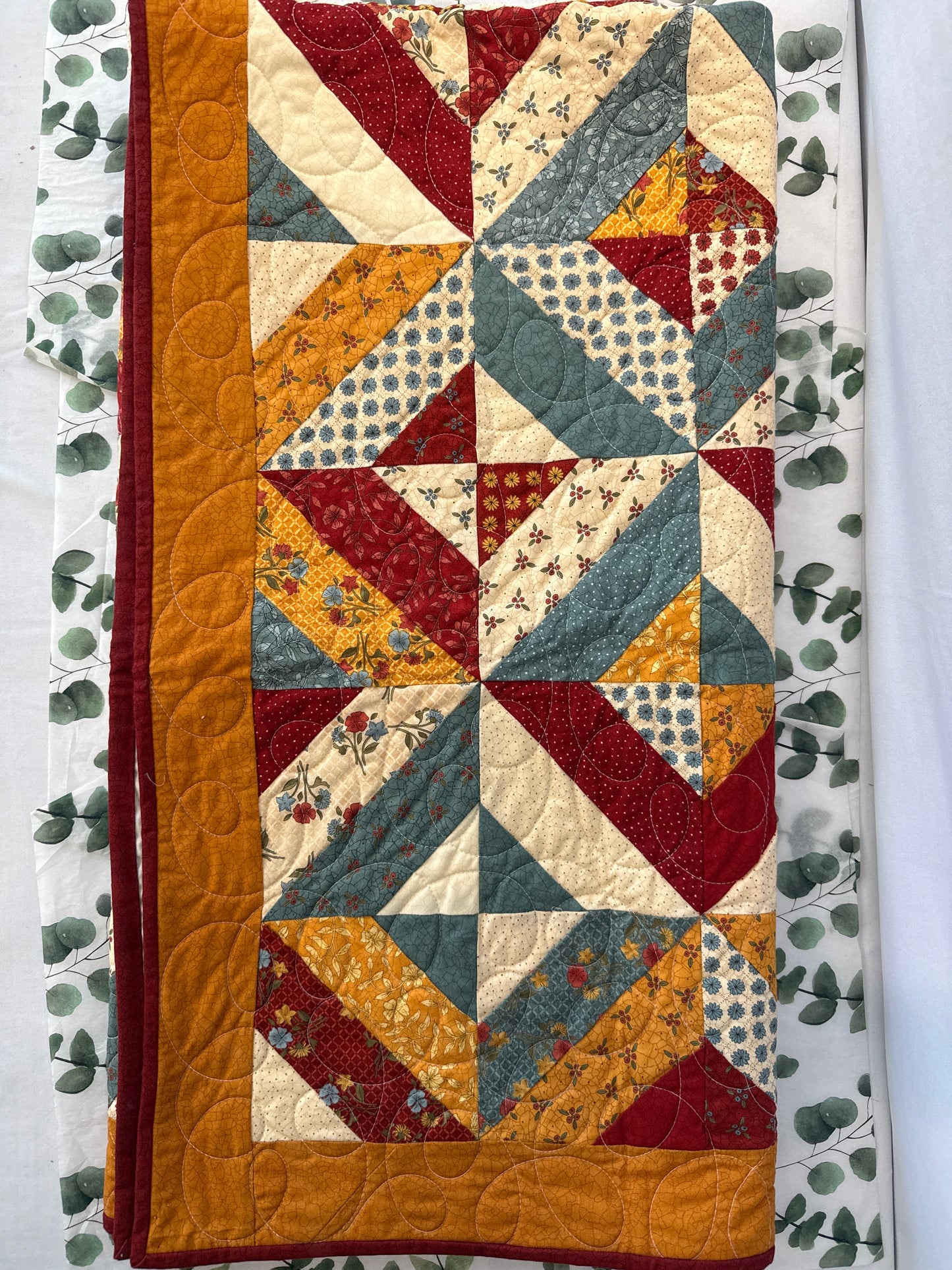 Floral with berries, earth-tone quilt 57” x 46”