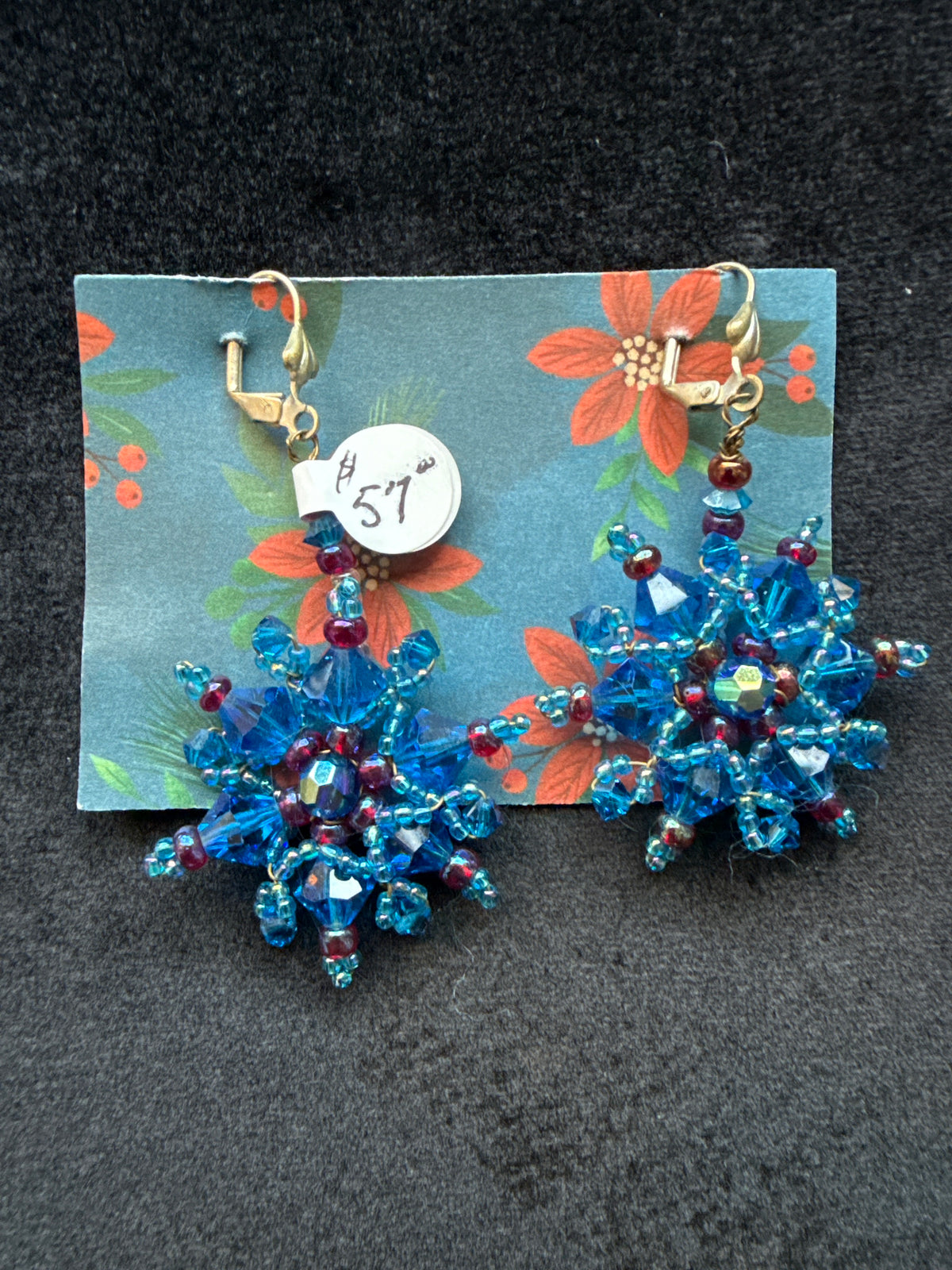 #680 blue wire beaded snowflake earrings