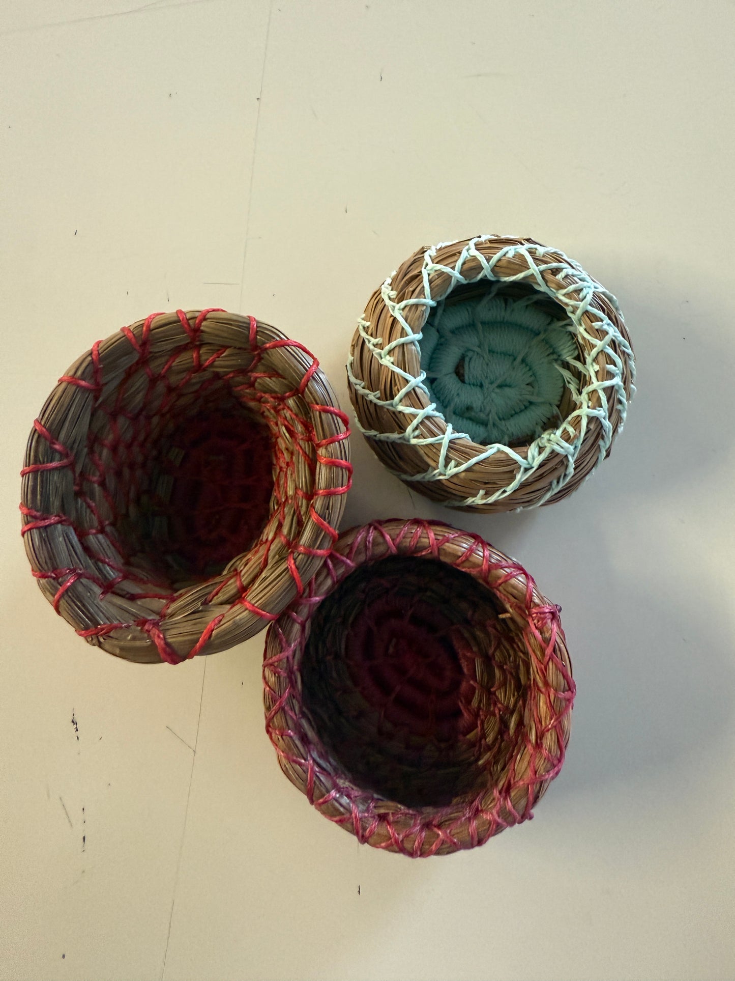 Assorted Pink, light turqoise, red Pine needle baskets