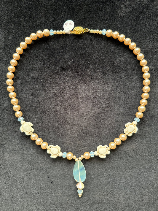 #541 vintage glass, pearls and beige turtle necklace