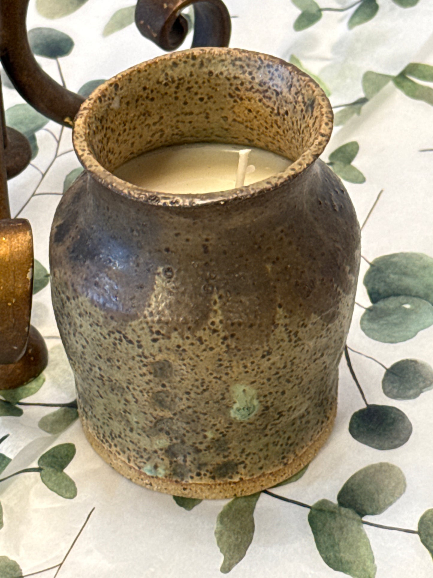 Green speckled vase candle