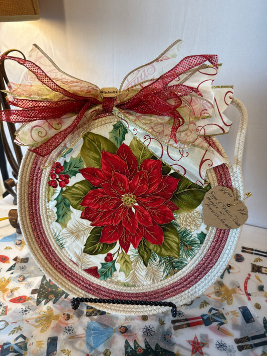 Rope and fabric door hanger with poinsettia accents