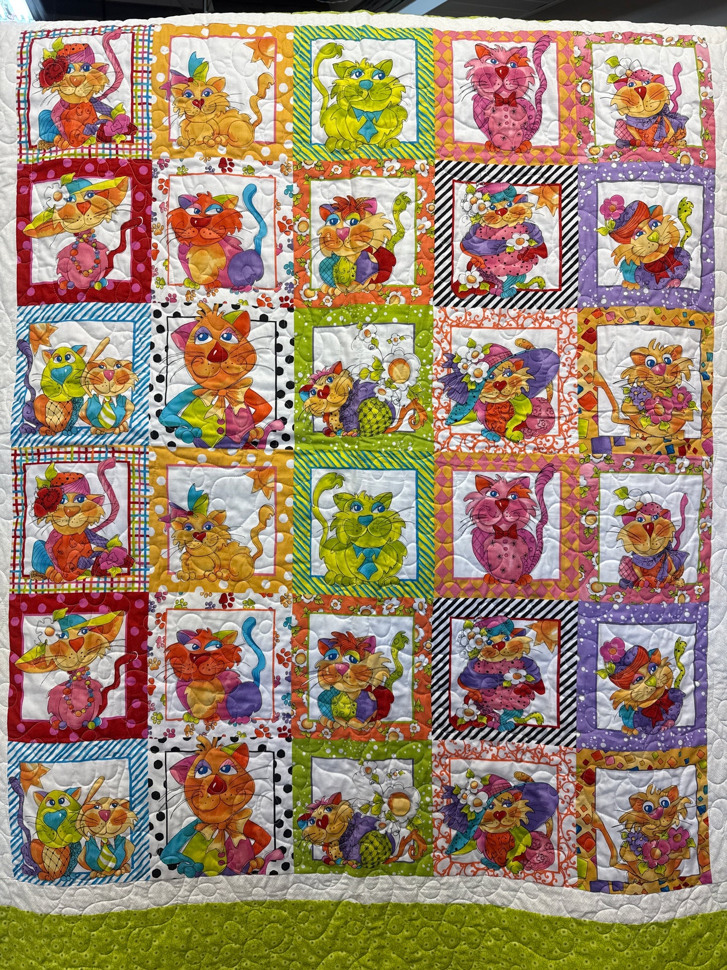 Child’s quilt, crazy cats