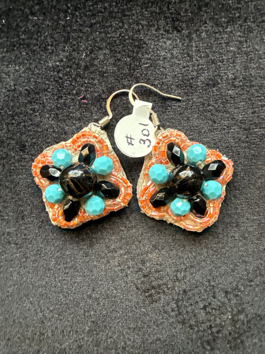 #301 hand, crystal, turquoise, black, and peach braided earrings