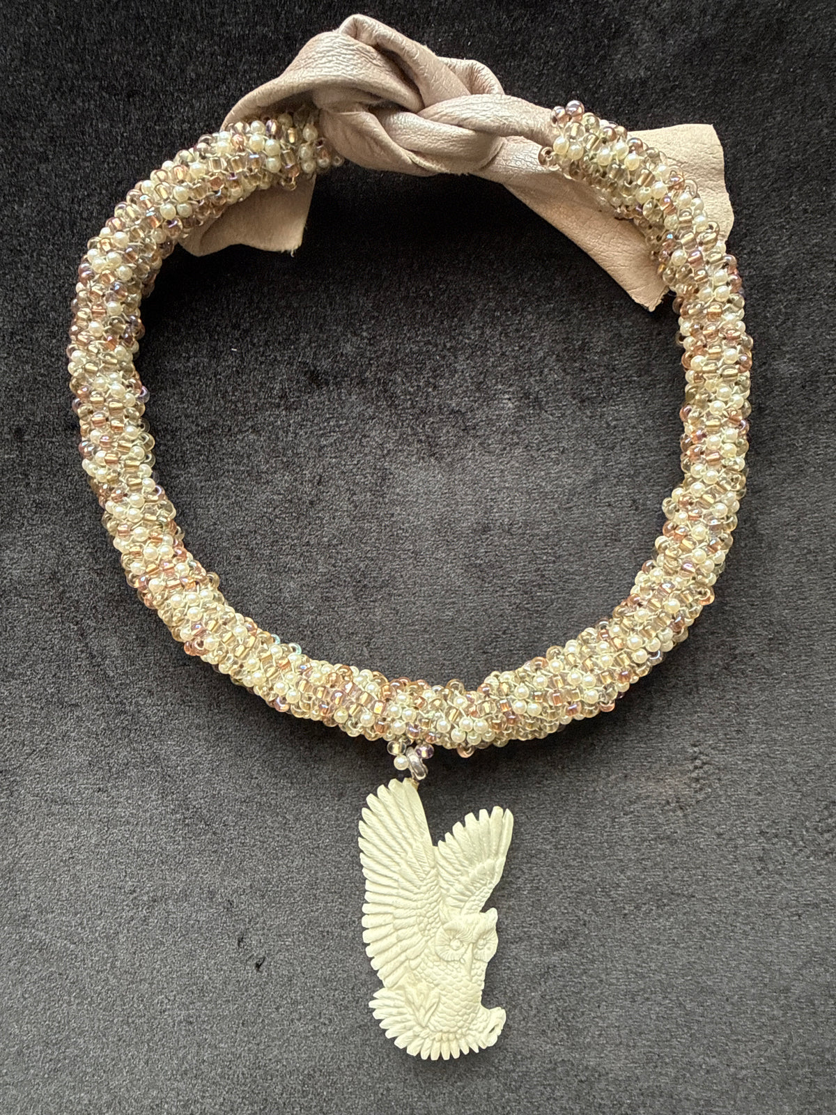 ￼#419 carved bone out pendant and seed bead necklace