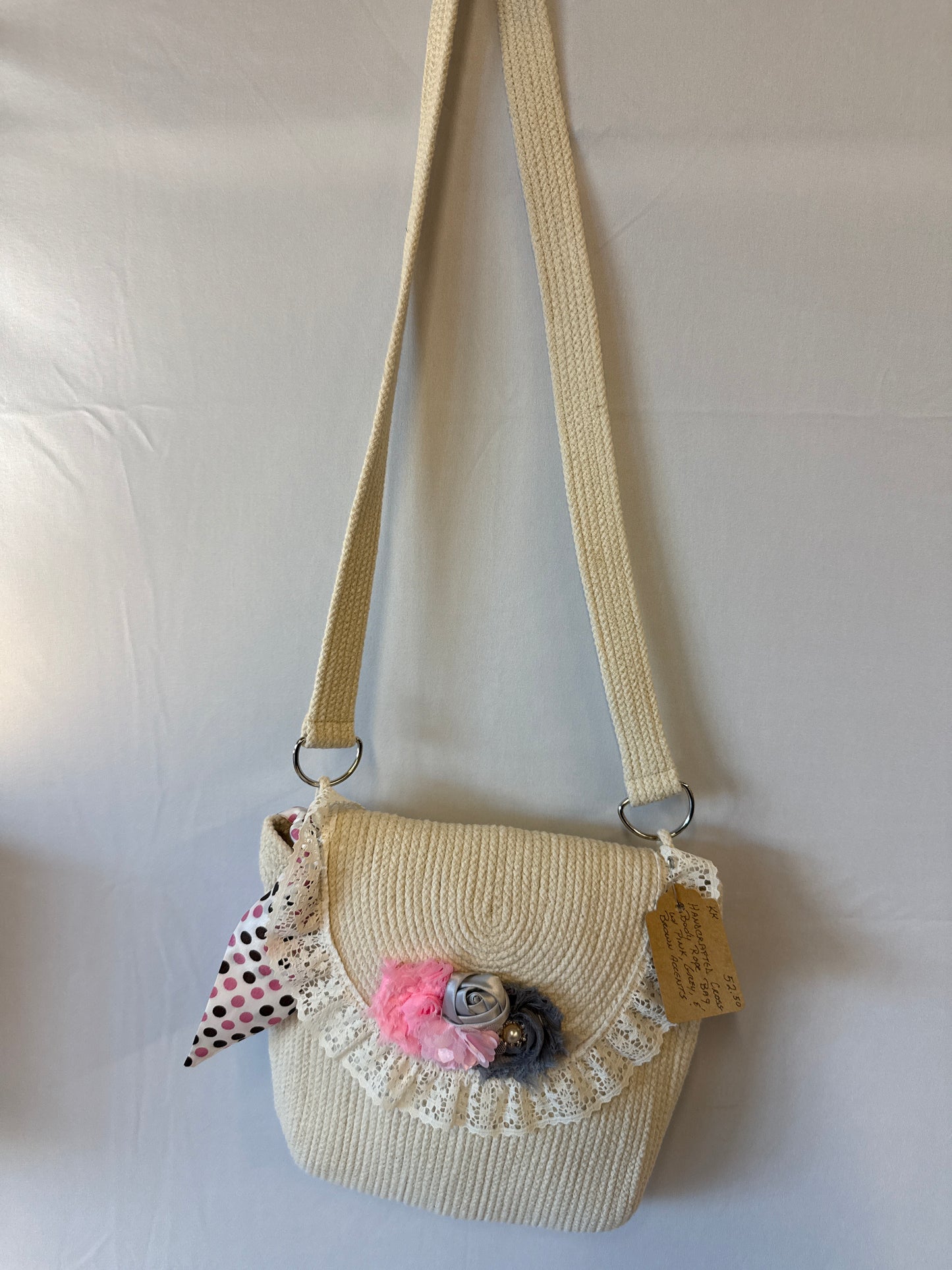 Handcrafted Crossbody bag with pink gray and brown accents
