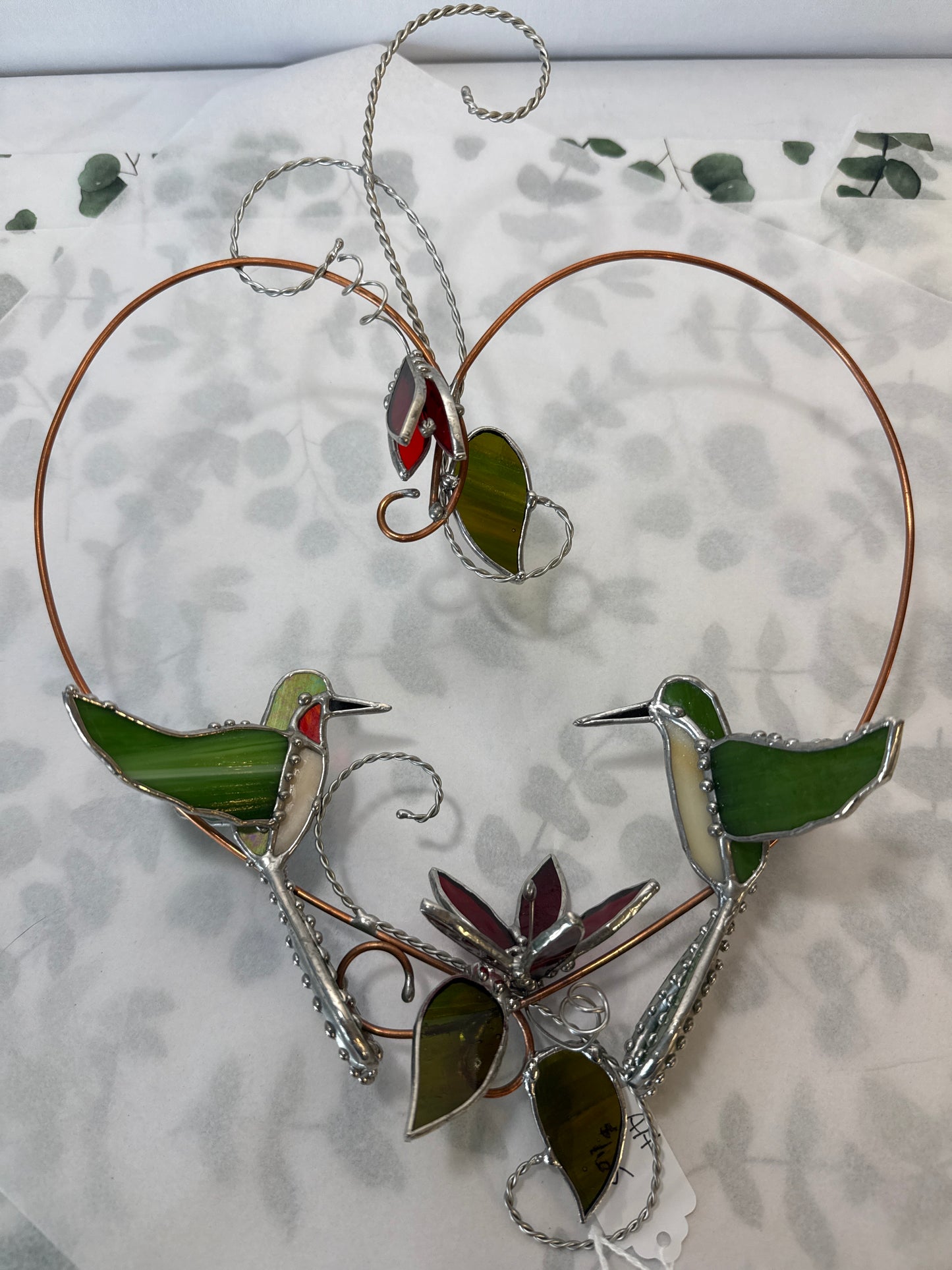 Pair of hummingbirds with copper wire