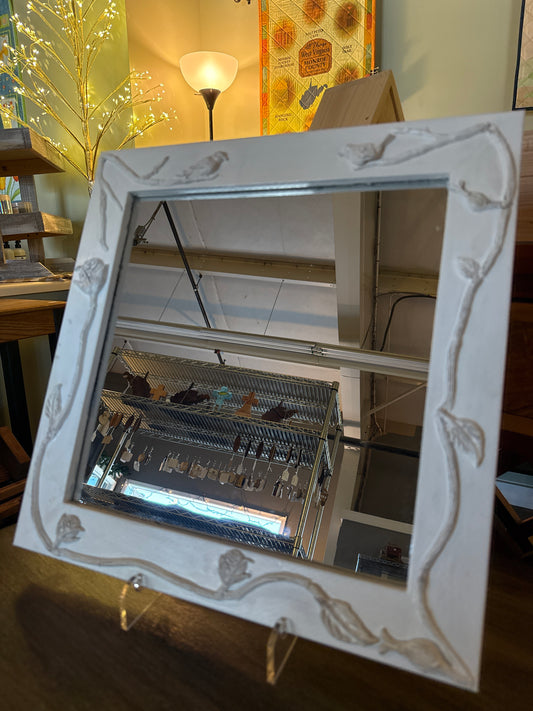 Mirror with birds